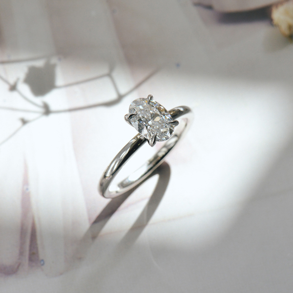 Classic Oval Solitaire Engagement Ring With Fine Tip Prongs-side