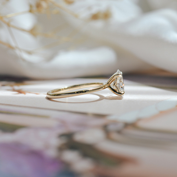 Solitaire Oval Engagement Ring With Whale Tail-side