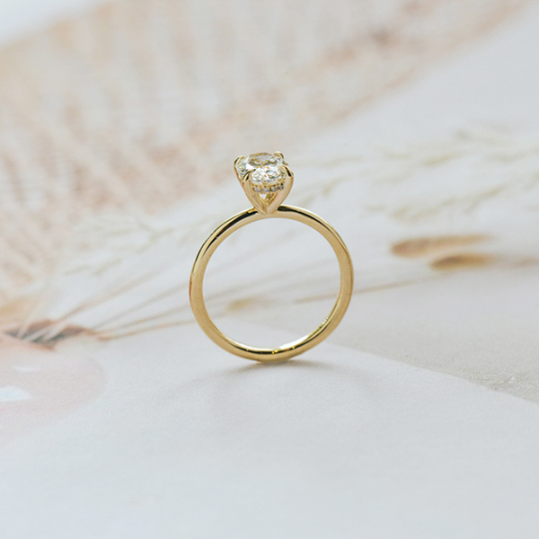 Oval Solitaire Engagement Ring With Hidden Halo And Tapered Band-profile