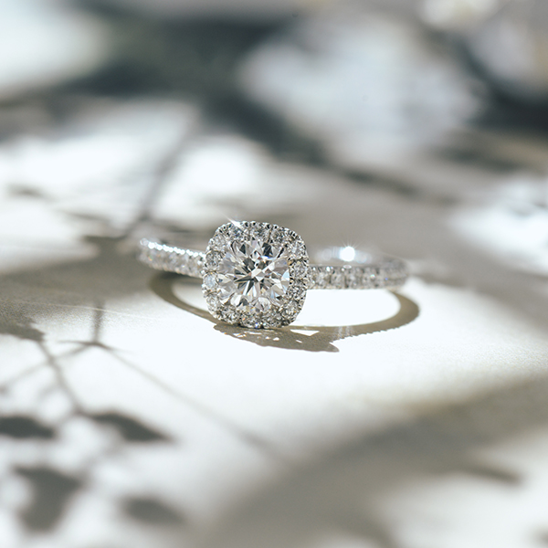Round Engagement Ring With Cushion Halo and Cathedral -top
