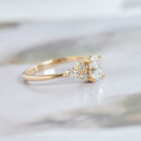 Oval Engagement Ring With Round And Marquise Side Stones-side
