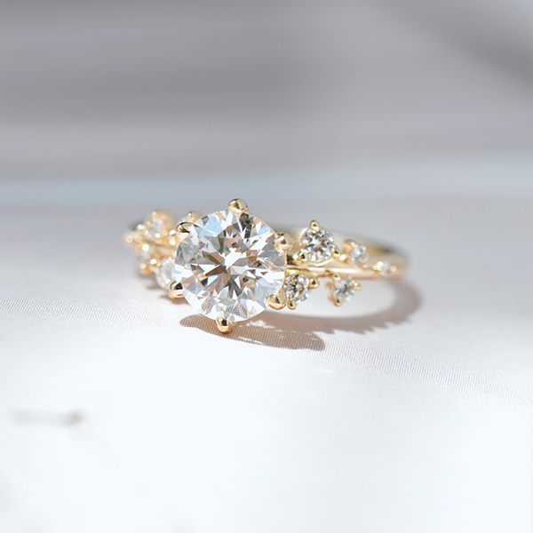 Round Engagement Ring With Clustered Stones -top
