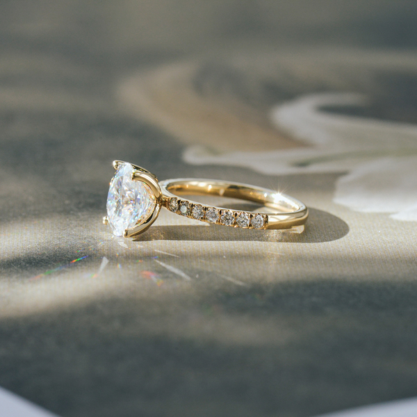 Oval Engagement Ring With Pavé Band and Petal Prong Setting-side