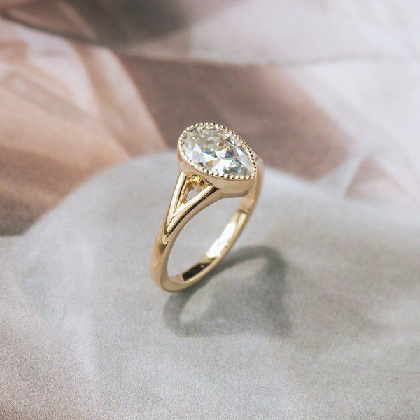 Bezel Set Pear Engagement Ring With Split-Shank-side