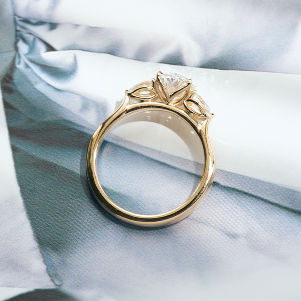 Oval 3 Stone Engagement Ring With Pear-profile