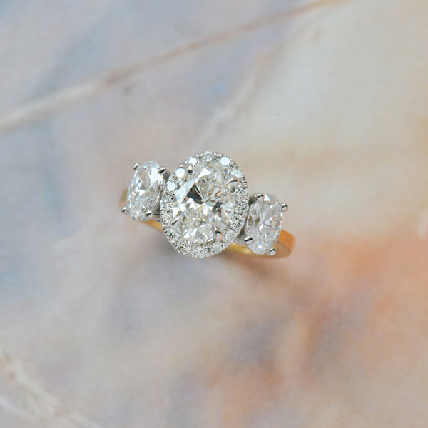Two-Tone 3-Stone Oval Halo Engagement Ring-top