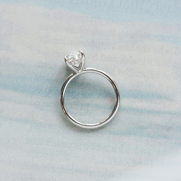 Classic Oval Solitaire Engagement Ring With Hidden Halo-profile