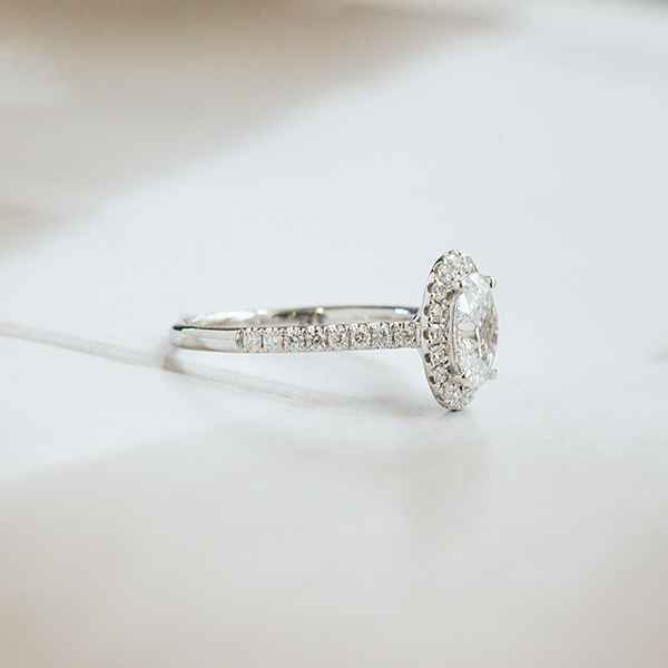 Oval Halo Engagement Ring With Pavé Band -side