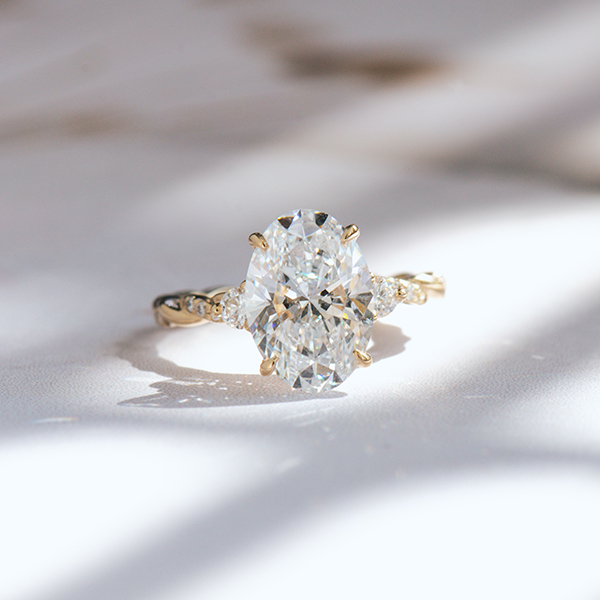 Oval 3-Stone Engagement Ring With Pavé Twist Band-top