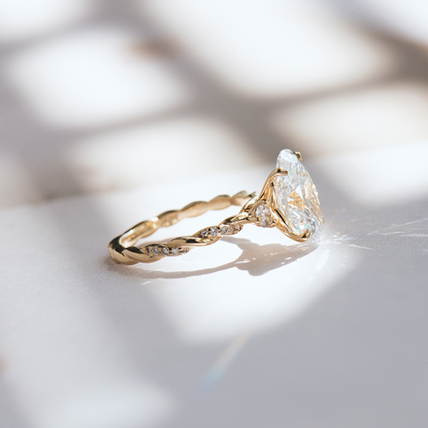 Oval 3-Stone Engagement Ring With Pavé Twist Band-side
