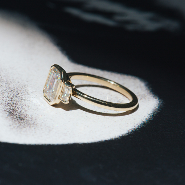 Bezel Set 3-Stone Emerald-Cut Engagement Ring Side